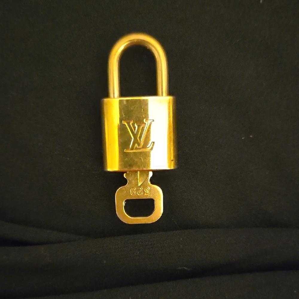 Louis Vuitton Gold Padlock Jewelry